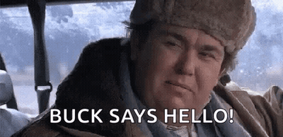 Man In Fur Hat In Car Saying Buck Says Hello GIF