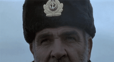 Man In Fur Hat With Anchor GIF