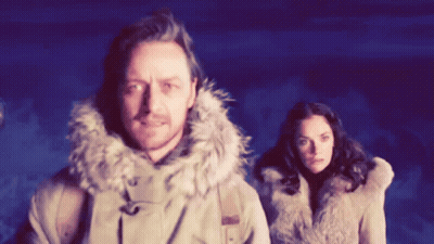 Man In Fur Hooded Jacket Next To Woman GIF