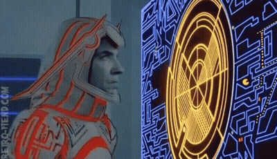 Man In Futuristic Suit Standing In Dark Room With Mem GIF