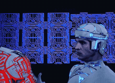 Man In Futuristic Suit Standing In Front Of Maze Saying Eee GIF