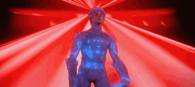 Man In Futuristic Suit Standing In Front Of Red Background GIF