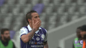 Man In Game Blowing Kisses GIF