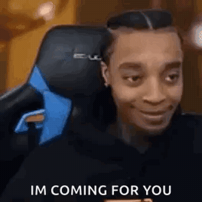 Man In Gaming Chair With Blue Tie Smiling GIF