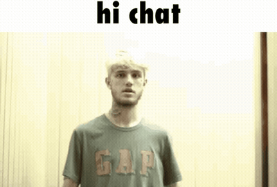 Man In Gap T-Shirt Standing In Front Of Wall GIF