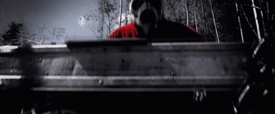 Man In Gas Mask Holding Metal GIF