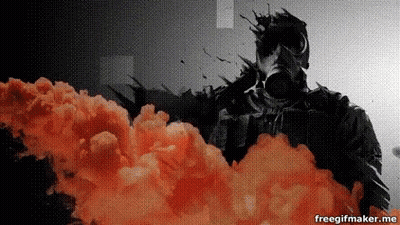 Man In Gas Mask Surrounded By Smoke GIF