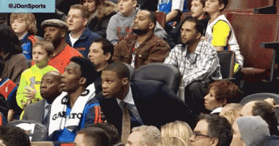 Man In Gas Mask Watching Basketball GIF