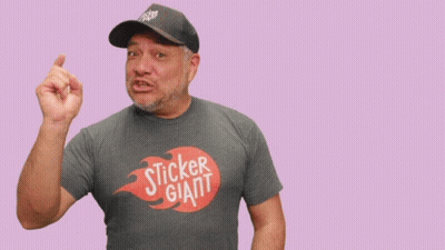 Man In Giant Sticker T-Shirt Pointing GIF