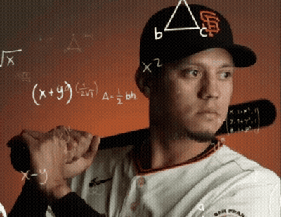 Man in Giants Baseball Uniform Holding Bat