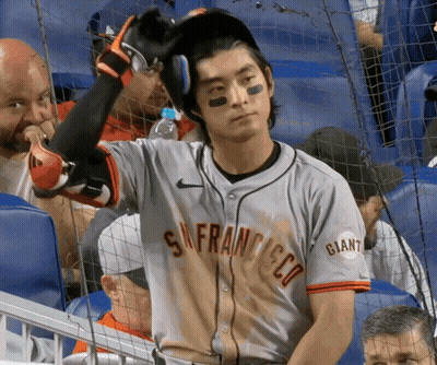 Man In Giants Jersey In Stands GIF