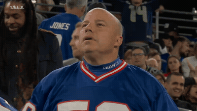 Man In Giants Jersey Watching Game GIF