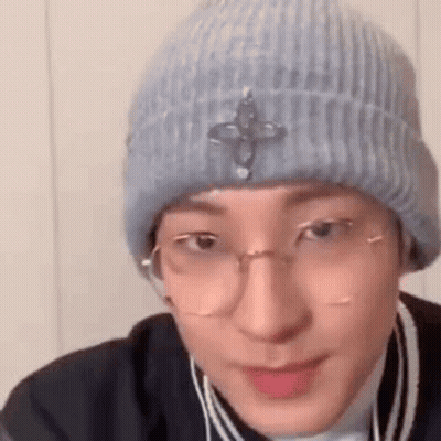 Man In Glasses And Beanie Making Funny Face GIF