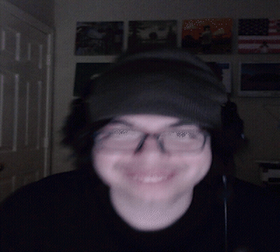 Man In Glasses And Beanie Sticking Out Tongue GIF