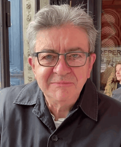 Man In Glasses And Black Jacket In Front Of Repeper Sign GIF
