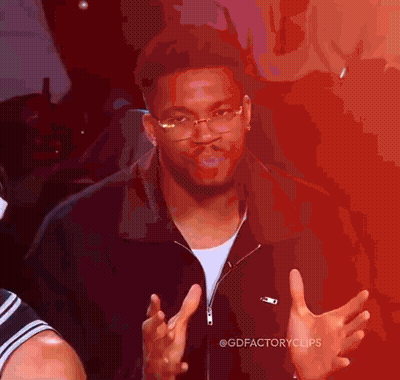 Man In Glasses And Black Jacket Making Funny Face GIF