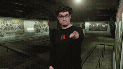Man In Glasses And Black La Shirt GIF