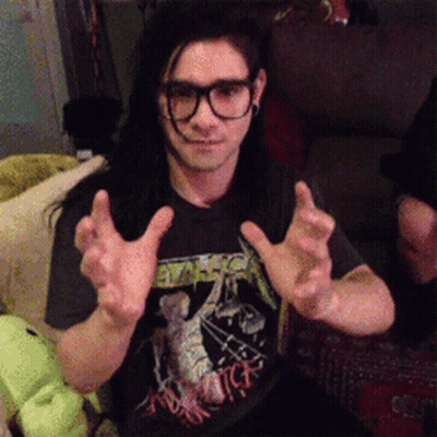 Man In Glasses And Black Metallica Shirt GIF