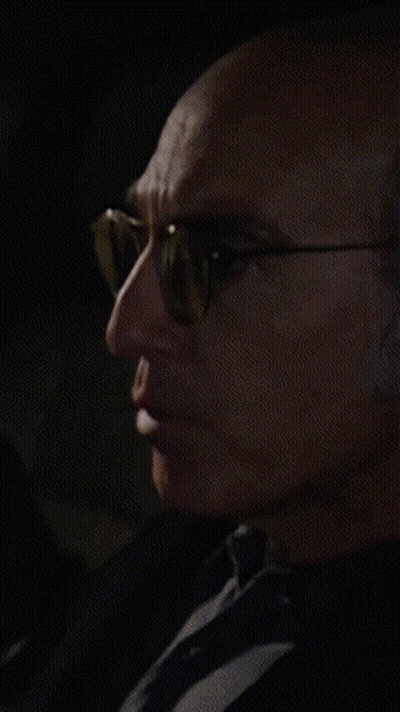 Man In Glasses And Black Shirt By Window GIF