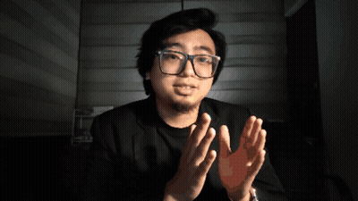 Man In Glasses And Black Shirt Giving Applause GIF