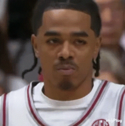 Man In Glasses And Black Shirt Looking Down GIF