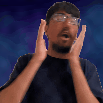 Man In Glasses And Black Shirt Making Funny Face GIF