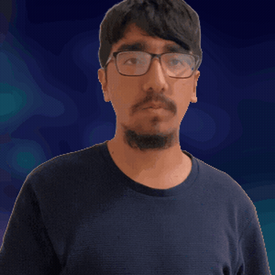 Man in Glasses and Black Shirt Making Gesture