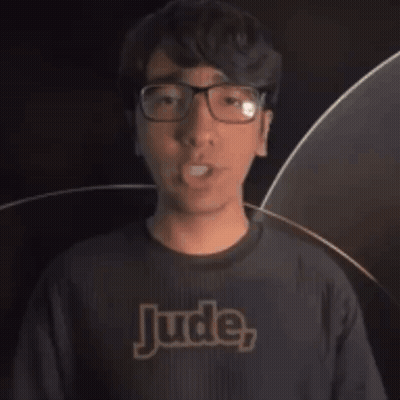 Man In Glasses And Black Shirt Saying Jude GIF