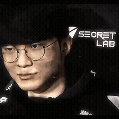 Man In Glasses And Black Shirt Saying Secre La GIF