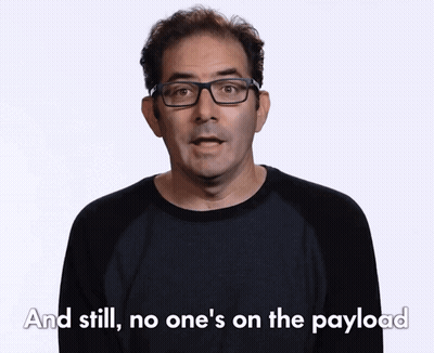 Man In Glasses And Black Shirt Says And Still No One's On The Payload GIF