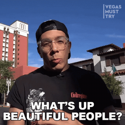 Man in Glasses and Black Shirt Says What's Up Beautiful People