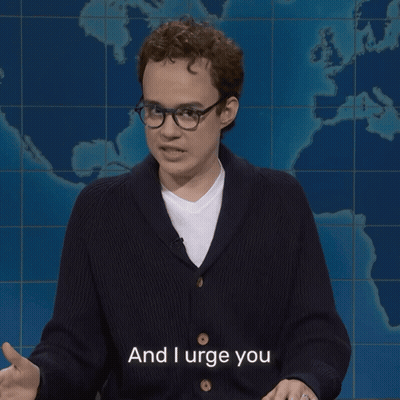 Man In Glasses And Black Sweater Urging Stop GIF
