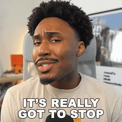 Man In Glasses And Black Sweater Urging Stop GIF