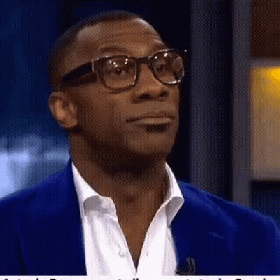 Man In Glasses And Blue Jacket Looking Up GIF