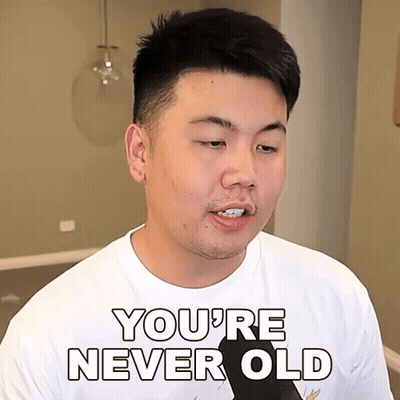 Man In Glasses And Blue Jacket With Shunver 24K GIF