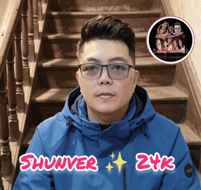 Man In Glasses And Blue Jacket With Shunver 24K GIF