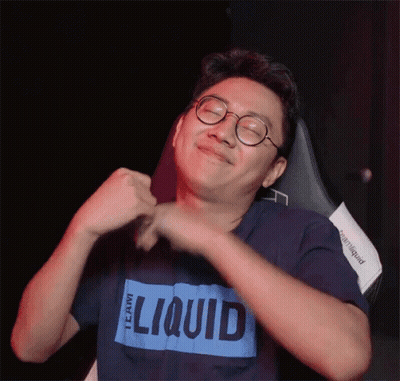 Man In Glasses And Blue Shirt Saying Liquid GIF