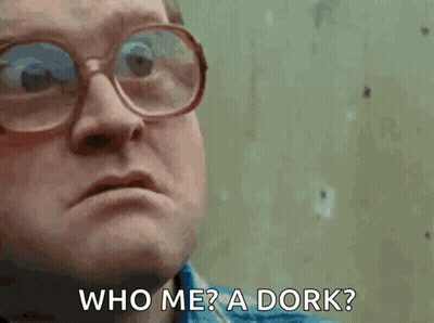 Man In Glasses And Blue Shirt Saying Who Me A Dork GIF