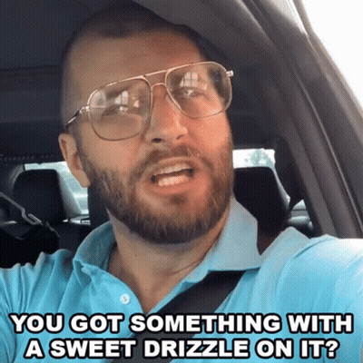 Man In Glasses And Blue Shirt Saying You Got Something With A Sweet Drizzle GIF
