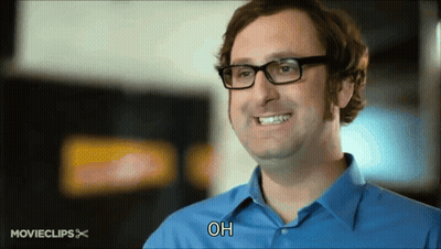 Man In Glasses And Blue Shirt Smiling Saying Oh GIF