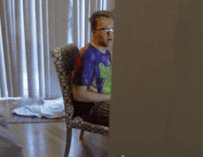 Man In Glasses And Blue Shirt With Frog GIF
