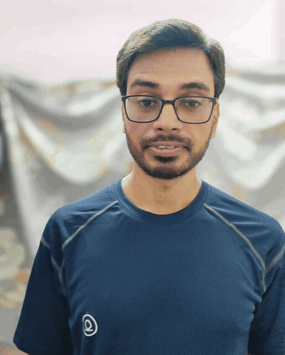Man In Glasses And Blue Shirt With White Circle GIF