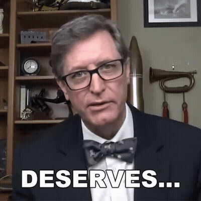 Man In Glasses And Bow Tie Saying Deserves GIF