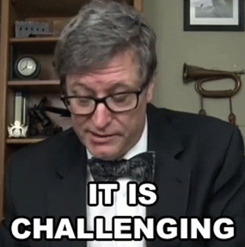 Man In Glasses And Bow Tie Says It Is Challenging GIF