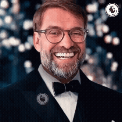 Man In Glasses And Bow Tie Smiling GIF