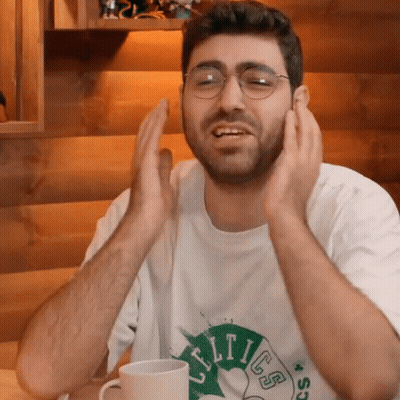 Man In Glasses And Celtics Shirt Clapping GIF