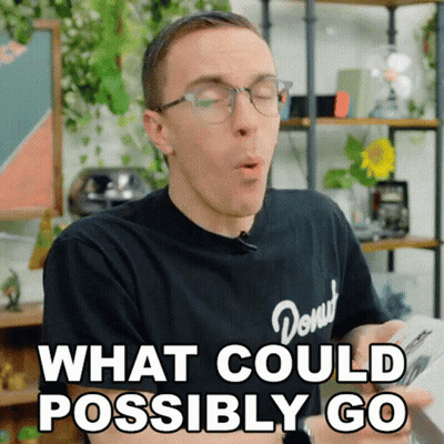 Man In Glasses And Donut T-Shirt Saying What Could Possibly Go GIF