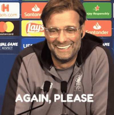 Man In Glasses And Gray Jacket Smiling Saying Again Please GIF