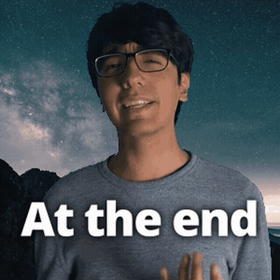 Man In Glasses And Gray Sweater Saying At The End GIF
