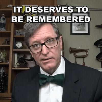 Man In Glasses And Green Bow Tie Says It Deserves To Be Remembered GIF